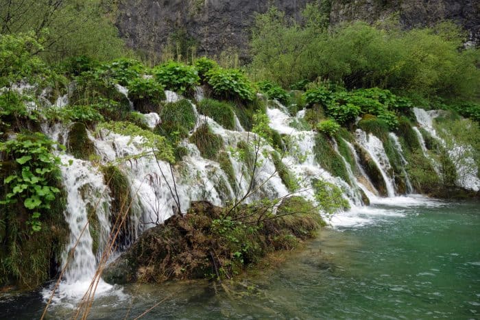 Exploring the otherworldly Plitvice Lakes, Croatia. How the rain became a blessing! when it is raining at plitvice lakes, how to get to plitvice lakes, where should I base myself for Plitvice lakes, nearest city to plitvice lakes, croatia, zadar, waterfalls, UNESCO, good base for plitvice lakes, weather, crowds, tips, 