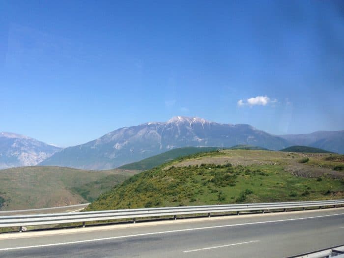 A guide to transport in Albania: Its not impossible but it is an experience!, bogove, berat, hitchhike, hitch hike, hitchhiking, is it safe, what do I do, public transport, taxi, scam, help, how to get around Albania, backpacking in albania, tirana, skhoder, berat, furgon, mini bus, timetable, local bus, cost, price, how to, sights from the window, village, real life, off the beaten track, off the beaten path, europe, eastern europe.