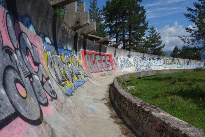 How To Get To the Sarajevo Bobsled Track, Sarajevo Olympic Bobsleigh, How to Visit the Abandoned Sarajevo Bobsled Track, Hiking To The Abandoned Sarajevo Bobsled Track, Sarajevo Bobsleigh Track, How to Visit the Abandoned Sarajevo Bobsled Track, Abandoned Olympic bobsled track in Sarajevo, Sarajevo abandoned bobsled track, Sarajevo 1984 bobsleigh, Sarajevo bobsleigh track, how to get to the bobsleigh track, olympics, 1984, winter olympics, urban exploration, urbex, abandoned, Yugoslavia, Bosnia, Herzegovina, balkans, war, civil war, Serbia, Croatia, balkan war, bullet holes, scars, remnants, soviet, communism, directions, walking, hiking, Backpacking the Balkans, Balkan trip, things to do in Sarajevo, things to do in Bosnia, alternative things to do in Sarajevo, Things to do in Bosnia and Herzegovina, how to get to the Sarajevo Bobsled Track, 