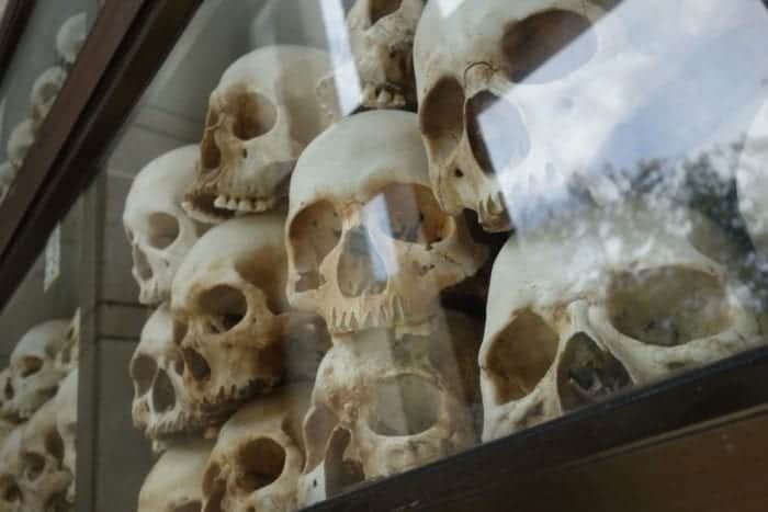 Visiting the Khmer Rouge Killing Fields of Choeung Ek & The Tuol Sleng Genocide Museum at S-21, Pol Pot, Khmer Rouge, what happened in Cambodia, Cambodian war, communism, genocide, Auschwitz, skulls, murder, how to get to the killing fields, prison, Phnom Penh, things to see, things you must see, what to do in Phnom Penh, guide, history, Choeung Ek Phnom Penh, entrance fee, stupa, 