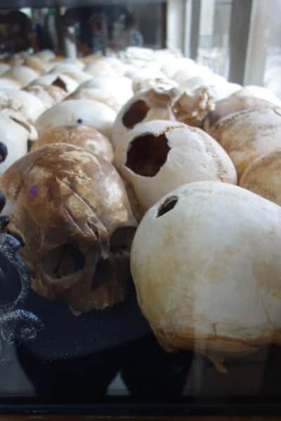 Visiting the Khmer Rouge Killing Fields of Choeung Ek & The Tuol Sleng Genocide Museum at S-21, Pol Pot, Khmer Rouge, what happened in Cambodia, Cambodian war, communism, genocide, Auschwitz, skulls, murder, how to get to the killing fields, prison, Phnom Penh, things to see, things you must see, what to do in Phnom Penh, guide, history, Choeung Ek Phnom Penh, entrance fee, stupa, 