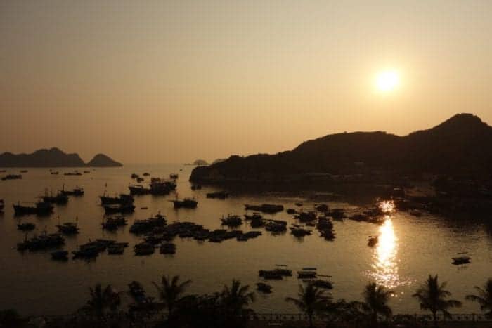 sunset, bay, Heading to Cat Ba island and doing amazing Ha Long bay on a backpacker budget, Ha Long Bay Vietnam, Ha Long bay cruise, Ha Long bay tours, Ha Long bay trip, Halong bay, Kayak, cheap, budget, from Hanoi, Ha Long bay without a tour, Money island, hike, monkeys, beach, swim, karst, mountain, Cat Ba Vietnam, Cat Ba Island, Cat ba hotel, Cat Ba island Vietnam