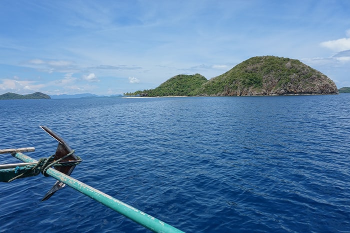 A guide to the isolated island of Coron and its many beautiful islands, Lagoons, wrecks and beaches, Philippine, El Nido, Palawan, Beaches, Sea, Sun, Sand, Vacation, Holiday, Thailand, South East Asia, Alternative to Thailand, Karst, Ha Long bay, Turquoise sea, SCUBA, Wreck Dive, Snorkel, Tours, Trips, boat trip, Boat tour, Swimming in the sea, Coral , Sealife, Marine life, Traditional Filipino boat, Kayangan Lake, Twin Lagoon, Barracuda lake, Banol Beach, CYC Beach, Siete Pecados Marine Park, Clown Fish, Nemo, Skeleton Wreck, Mt Tapyas, Hike, Things to do in Coron, What to do in Coron, Boat trips in Coron, mountain, coron palawan philippines, Coron tour packages, Coron Island, Coron Philippines, 