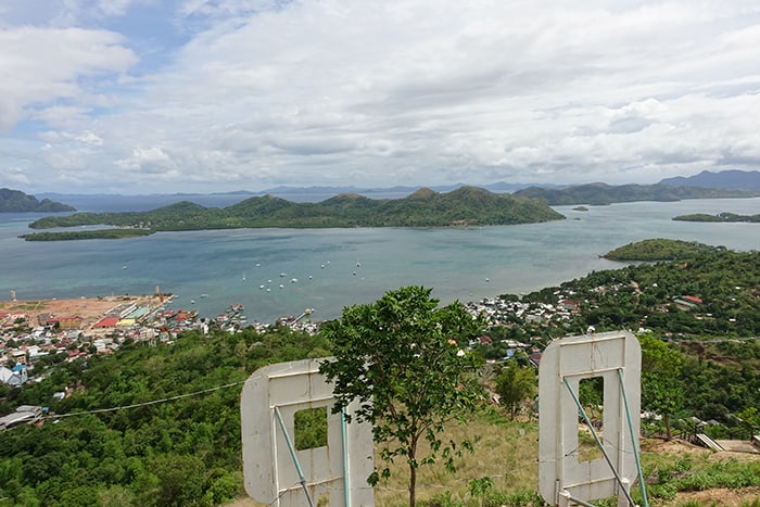 A guide to the isolated island of Coron and its many beautiful islands, Lagoons, wrecks and beaches, Philippine, El Nido, Palawan, Beaches, Sea, Sun, Sand, Vacation, Holiday, Thailand, South East Asia, Alternative to Thailand, Karst, Ha Long bay, Turquoise sea, SCUBA, Wreck Dive, Snorkel, Tours, Trips, boat trip, Boat tour, Swimming in the sea, Coral , Sealife, Marine life, Traditional Filipino boat, Kayangan Lake, Twin Lagoon, Barracuda lake, Banol Beach, CYC Beach, Siete Pecados Marine Park, Clown Fish, Nemo, Skeleton Wreck, Mt Tapyas, Hike, Things to do in Coron, What to do in Coron, Boat trips in Coron, mountain, coron palawan philippines, Coron tour packages, Coron Island, Coron Philippines, 