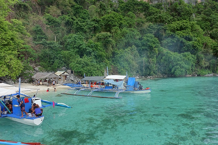 A guide to the isolated island of Coron and its many beautiful islands, Lagoons, wrecks and beaches, Philippine, El Nido, Palawan, Beaches, Sea, Sun, Sand, Vacation, Holiday, Thailand, South East Asia, Alternative to Thailand, Karst, Ha Long bay, Turquoise sea, SCUBA, Wreck Dive, Snorkel, Tours, Trips, boat trip, Boat tour, Swimming in the sea, Coral , Sealife, Marine life, Traditional Filipino boat, Kayangan Lake, Twin Lagoon, Barracuda lake, Banol Beach, CYC Beach, Siete Pecados Marine Park, Clown Fish, Nemo, Skeleton Wreck, Mt Tapyas, Hike, Things to do in Coron, What to do in Coron, Boat trips in Coron, mountain, coron palawan philippines, Coron tour packages, Coron Island, Coron Philippines, 