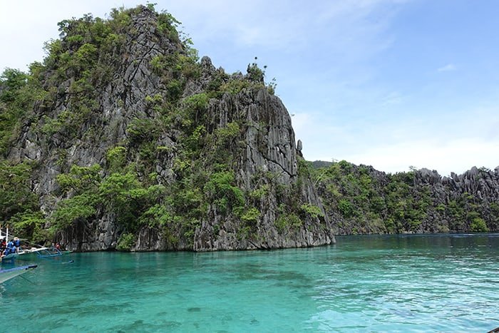 A guide to the isolated island of Coron and its many beautiful islands, Lagoons, wrecks and beaches, Philippine, El Nido, Palawan, Beaches, Sea, Sun, Sand, Vacation, Holiday, Thailand, South East Asia, Alternative to Thailand, Karst, Ha Long bay, Turquoise sea, SCUBA, Wreck Dive, Snorkel, Tours, Trips, boat trip, Boat tour, Swimming in the sea, Coral , Sealife, Marine life, Traditional Filipino boat, Kayangan Lake, Twin Lagoon, Barracuda lake, Banol Beach, CYC Beach, Siete Pecados Marine Park, Clown Fish, Nemo, Skeleton Wreck, Mt Tapyas, Hike, Things to do in Coron, What to do in Coron, Boat trips in Coron, mountain, coron palawan philippines, Coron tour packages, Coron Island, Coron Philippines, 