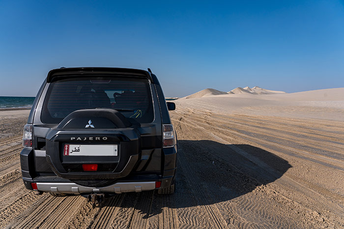 An SUV dune bashing at the inland desert outside of Doha, Qatar on a layover.