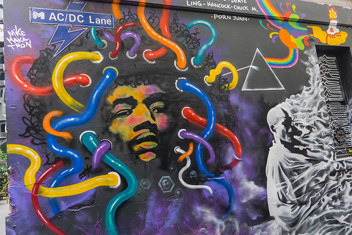 Street art depicting Jimi Hendrix and Rage Against The Machine on AD/DC Place in Melbourne