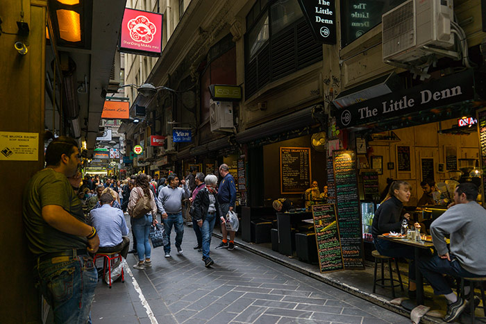 Looking down Degraves Street in Melbourne where you can see lots of cafes and people busy having lunch