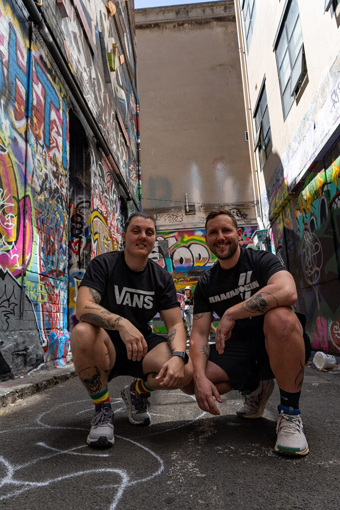 Nic and Shorty among the street art on Hozier lane in Melbourne